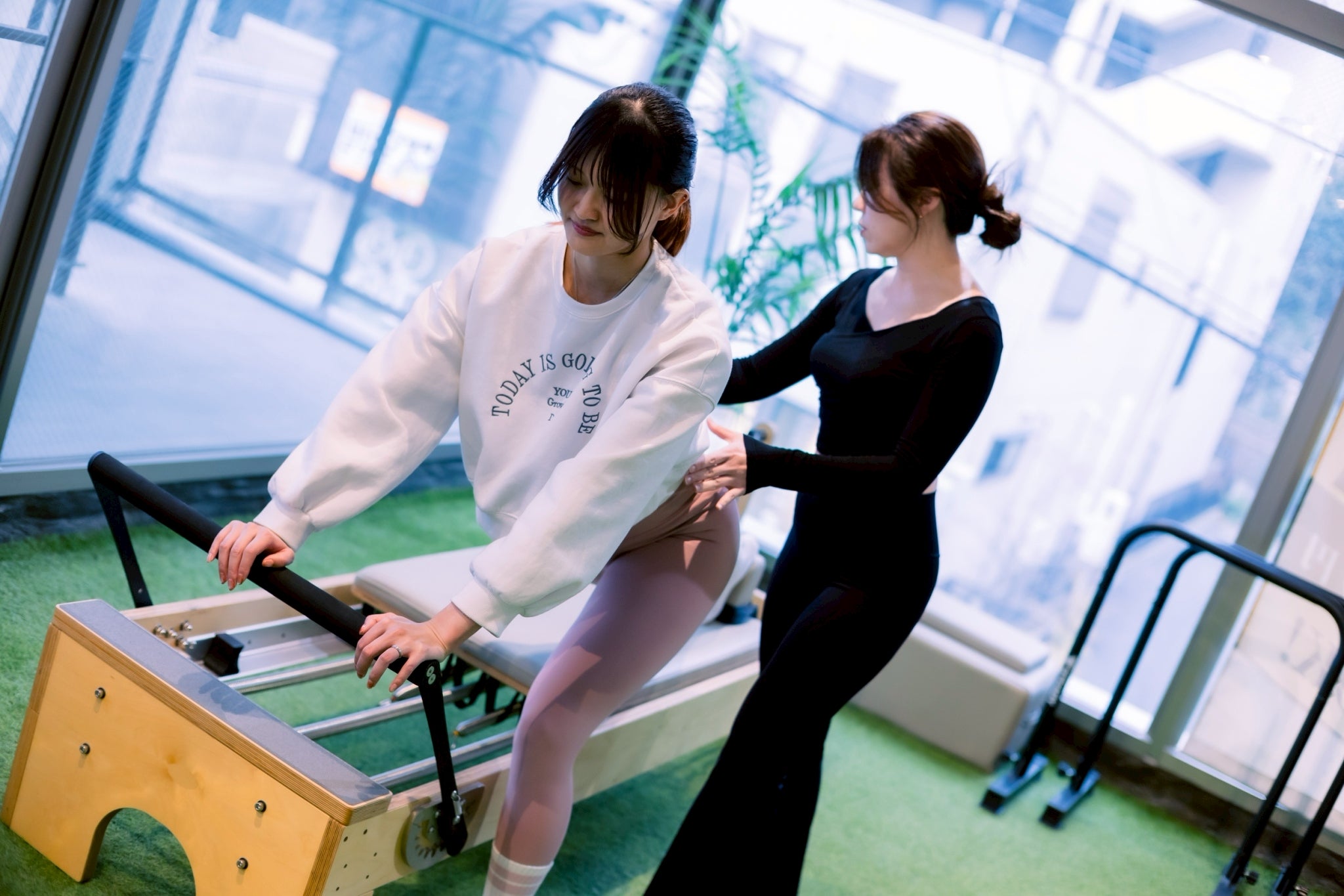 夏の「抱っこ疲れ」腰痛ケアの写真